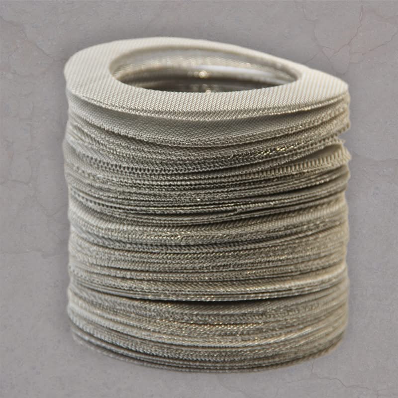 Stack of ESP downhole disc filter reusable cartridges